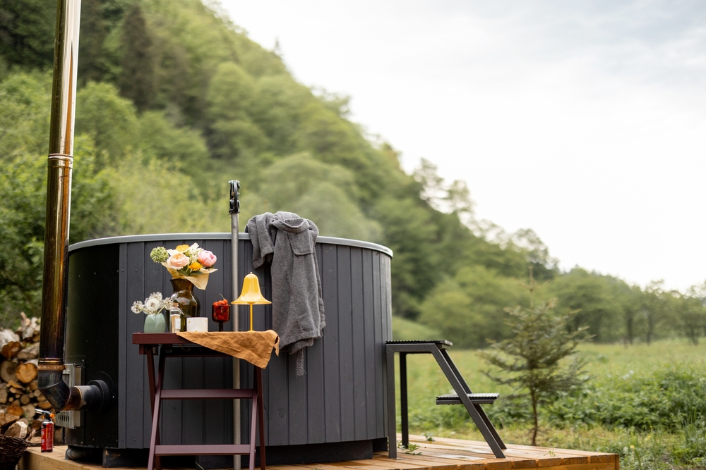 Outdoor hot tub on wood platform