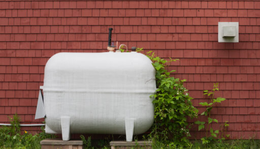 Heating fuel tank outside a house.