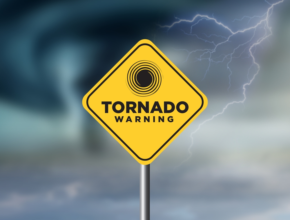 Tornado with warning sign