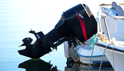 Close-up of a black outboard boat engine.