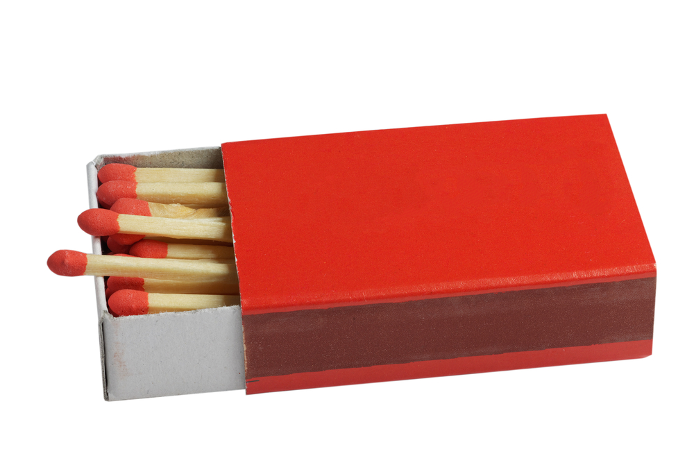 Redbox with red safety matches.