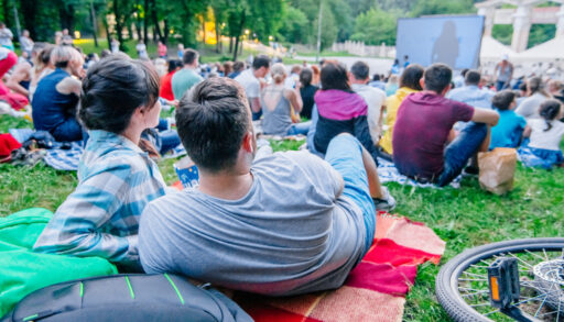 People watching an outdoor performance.