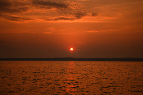 Dark orange sunset over the Bay of Quinte.