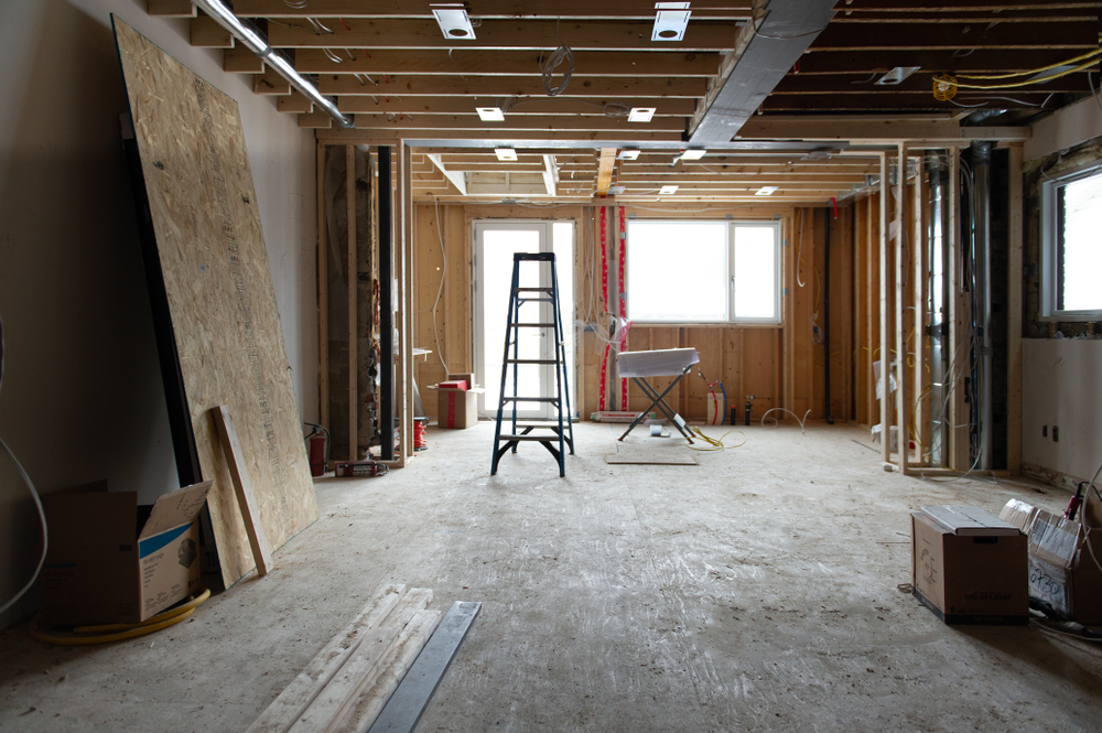 Renovation in a residential house with a ladder in the middle.