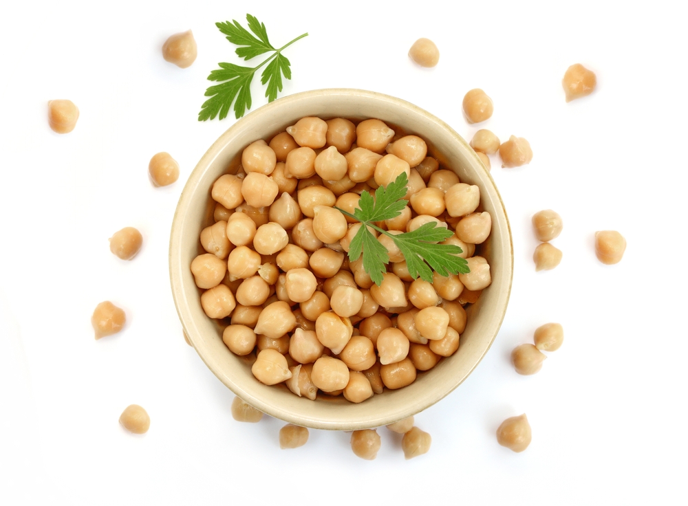 Ceramic bowl filled with chickpeas.