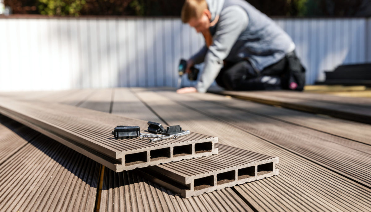 Man installing new deck boards.