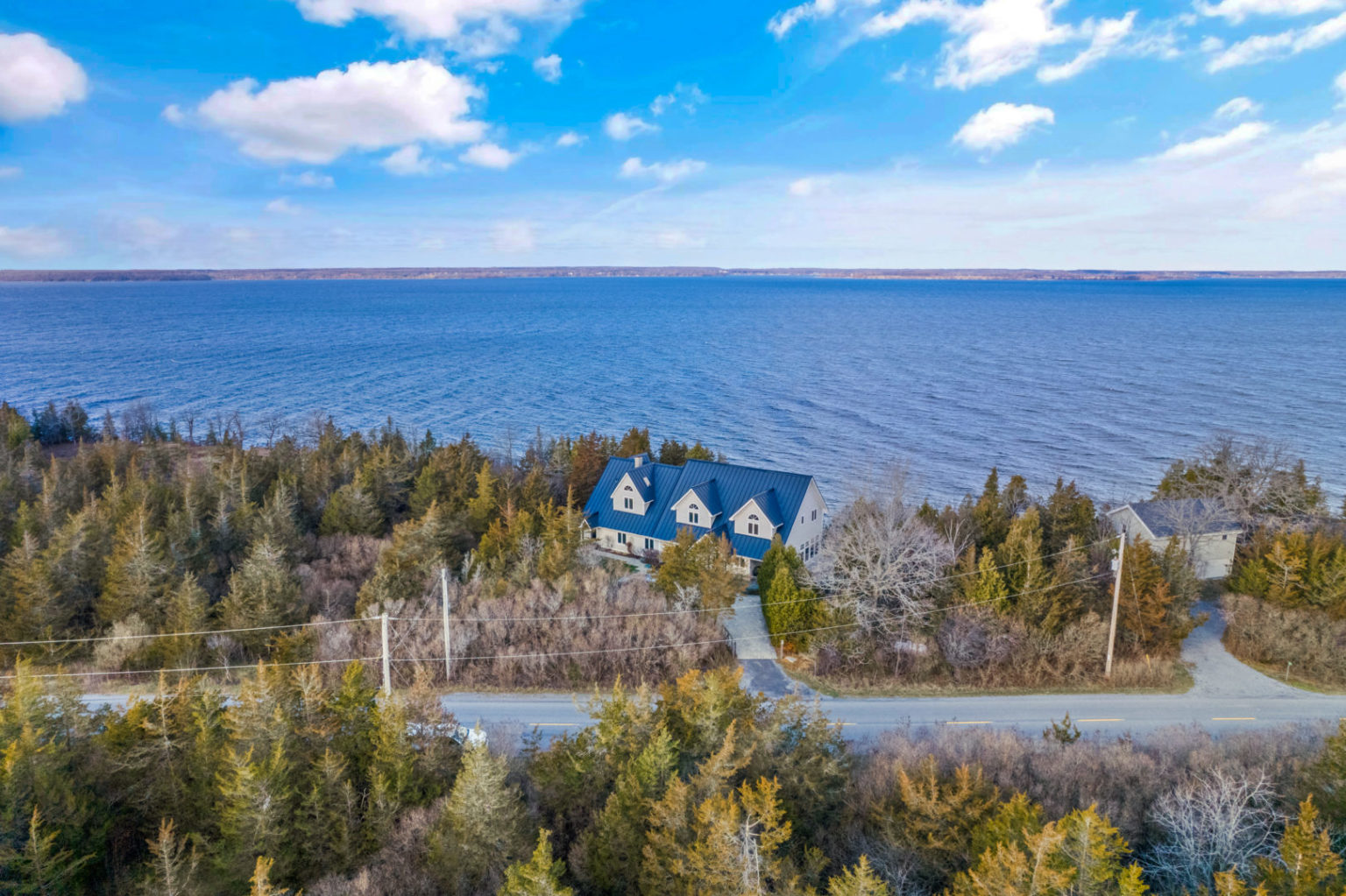 This secluded Prince Edward County property has lake views from every