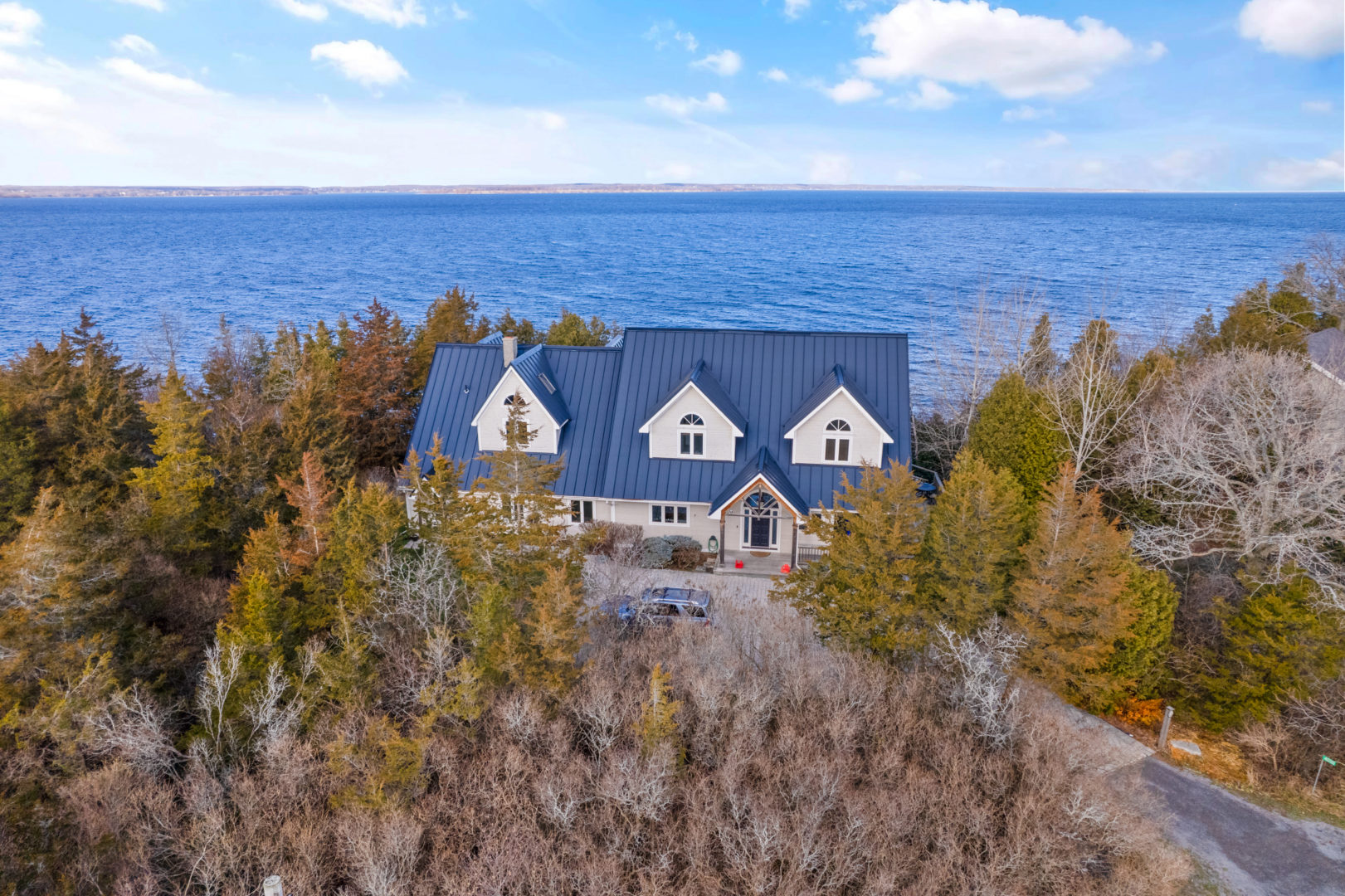 This secluded Prince Edward County property has lake views from every