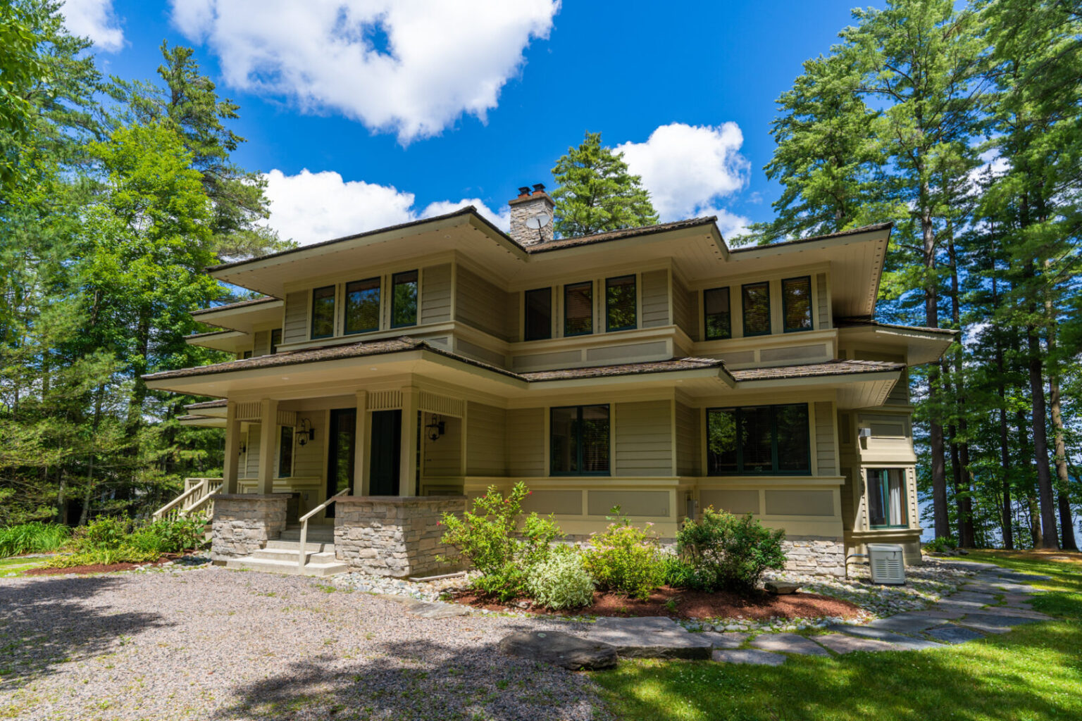 The 209 feet of shoreline at this Lake Muskoka cottage features swim