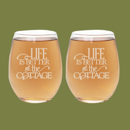 stemless wine glasses against a green background