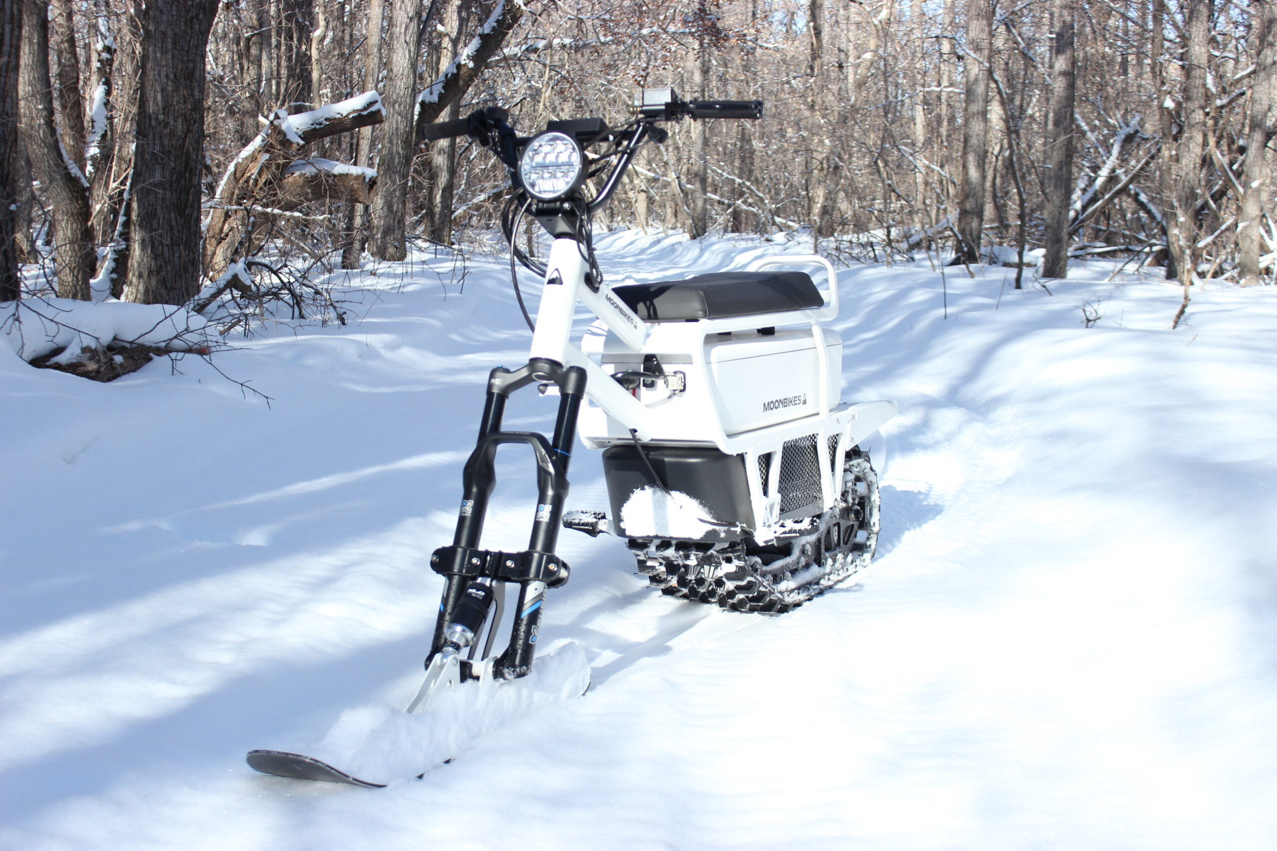 a photo of a white moonbike