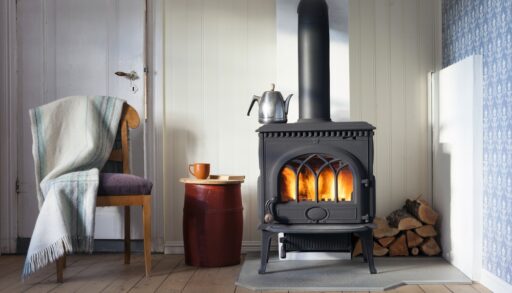 A wood-burning stove inside a cabin