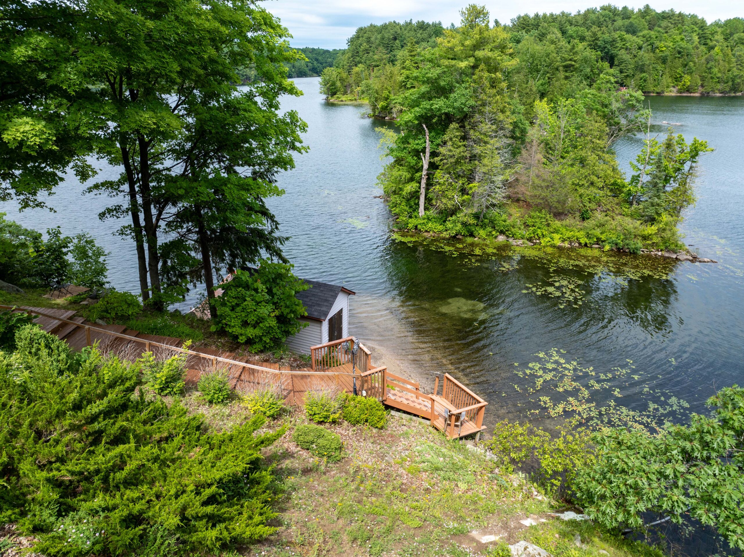 Wood steps lead down to the lake
