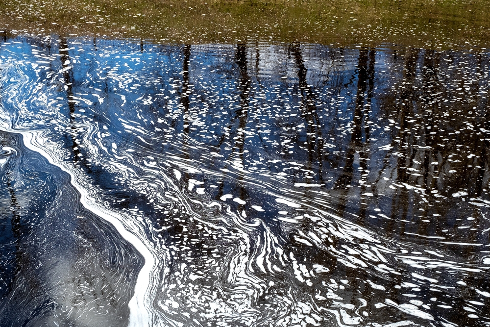 Close-up of foaming lake water