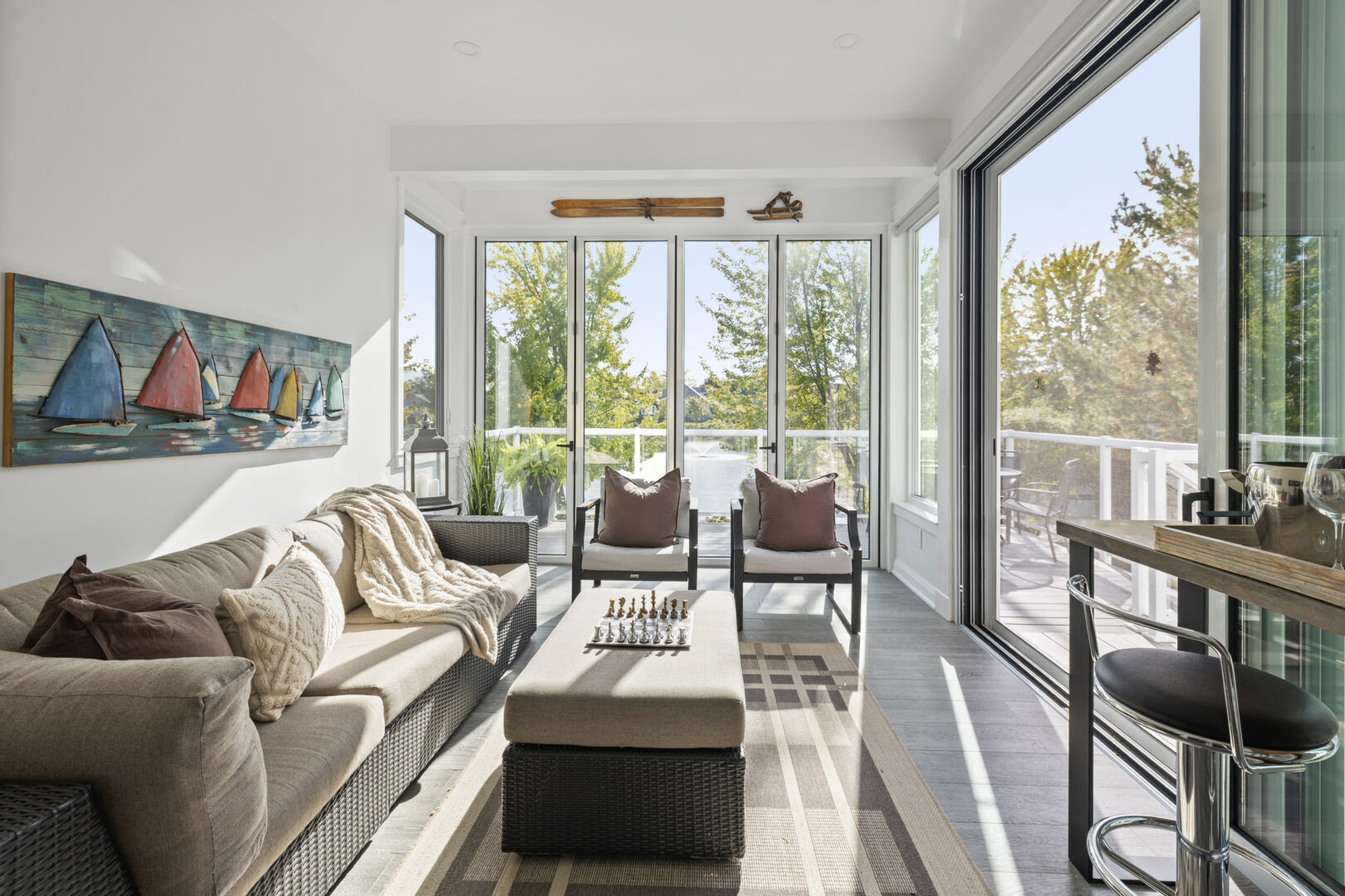 A sunny Muskoka room with a sitting area