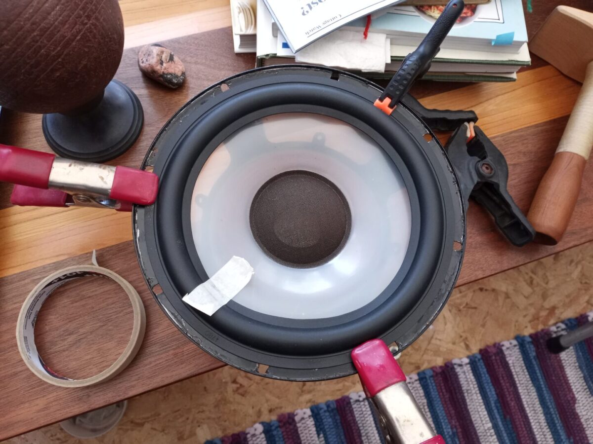 A vintage speaker undergoing repair
