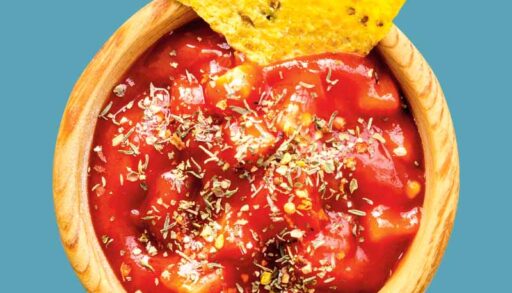 Salsa with a tortilla chip in it